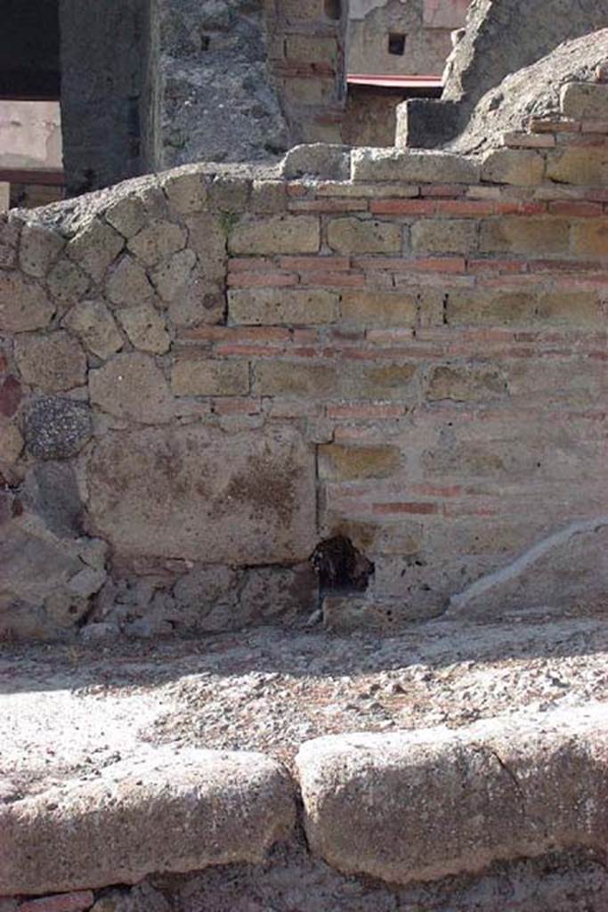 Cardo V Superiore, west side, Herculaneum, July 2001.
Exterior wall on south side of entrance at IV.16, looking west. Photo courtesy of Nicolas Monteix.